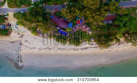 Aerial View Island With Tropical Sandy Beach And Trees In Pohon Batu Beach In Labuan Pearl Of Borneo
