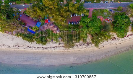 Aerial View Island With Tropical Sandy Beach And Trees In Pohon Batu Beach In Labuan Pearl Of Borneo