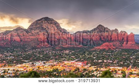 Sedona, Arizona, USA downtown cityscape and mountains.
