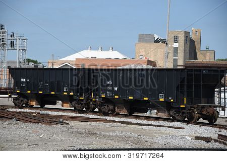 Chicago, Il July 13, 2019, A Pair Of Two Black Hopper Cars, Coal Cars Parked In A Railyard, Railroad