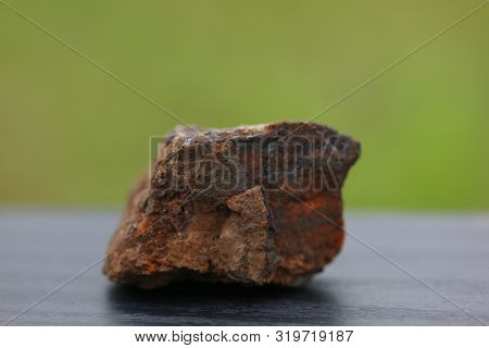 Iron Rock Minerals For Industry Isolate On Green Background
