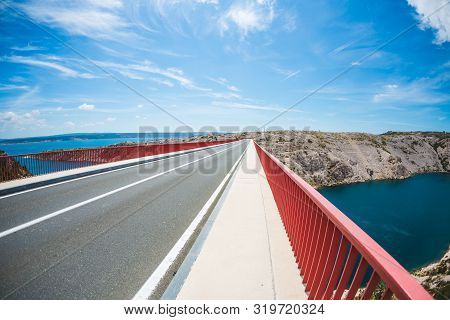 Red Bridge Over The Canyon In Croatia. View From The Bridge To The Canyon In The Krka National Park.