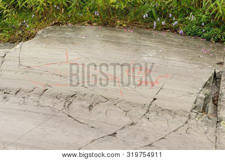 Rock Art In Alta Fjord, Norway. Ancient Symbols, Real Drawing,  Texture In Stone. Red Ocher Paint. H