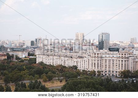 Cityscape Of Old Part Of Bucharest, With Many Worn Out Buildings, As Seen From The Palace Of Parliam