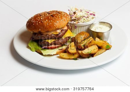 Burger With Double Pork Chop And Baked Potatoes