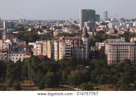 Cityscape Of Old Part Of Bucharest, With Many Worn Out Buildings, As Seen From The Palace Of Parliam