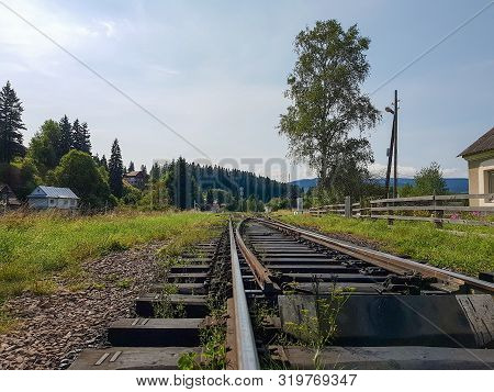 Beautiful Mountain Narrow-gauge Railway Road, Rails In The Mountains Of The Carpathians Passing Thro