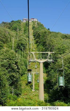 Laveno, Lake Maggiore, Italy. 16th August 2019. Riding The Bucket-lift Cablecar Up The Mountain Of S