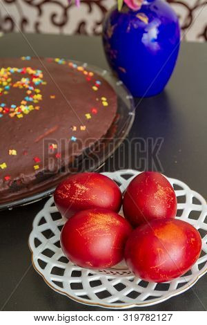 Chocolate Easter Cake With The Inscription Xb And Painted Eggs