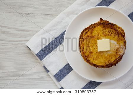 Homemade Corn Meal Johnny Cakes With Butter On A White Plate, Top View. Flat Lay, Overhead, From Abo