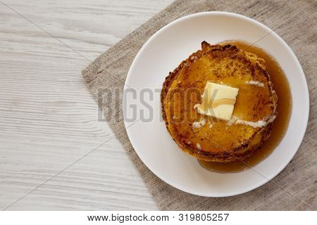 Homemade Corn Meal Johnny Cakes  On A White Plate, Overhead View. Flat Lay, From Above, Overhead. Sp