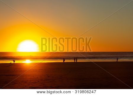 Sunset At Piha Beach, North Island, New Zealand