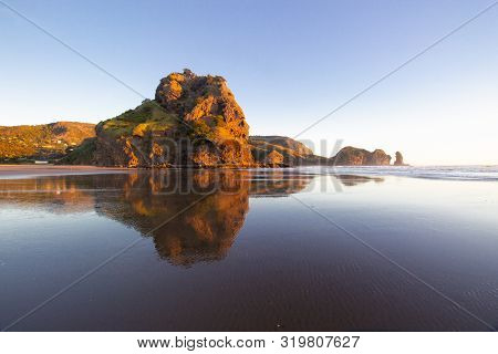 Beautiful Sunset At Piha Beach, New Zealand