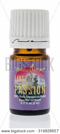 Winneconne, Wi - 28 August 2019 : A Bottle Of Young Living Live Passion Oil On An Isolated Backgroun