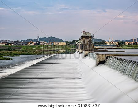 A Long Exposure Of The Nikaryo Kamigawara Seki, A Weir On The Tama River Near Kawasaki, Japan