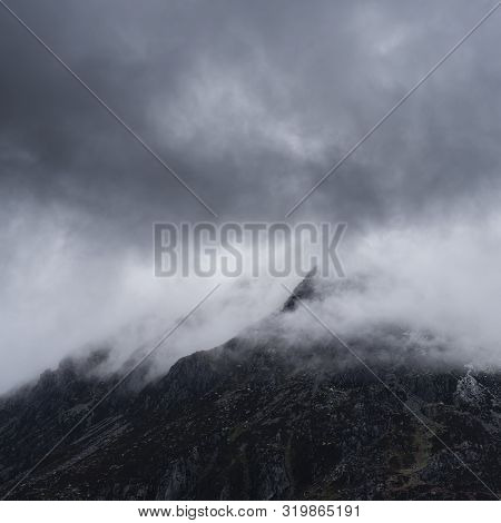 Stunning Detail Landscape Images Of Snowcapped Pen Yr Ole Wen Mountain In Snowdonia During Dramatic 