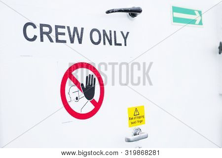 Crew Only Sign On White Door Onboard Ferry Cruise Ship