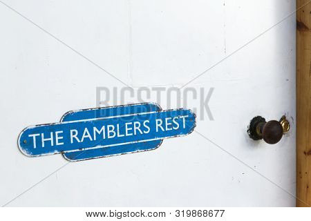 Ramblers Rest Room For Walkers Sign On White Weather Oak Door Distressed Paint