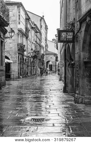 Santiago De Compostela, Spain; August 9, 2019: Stret Of A Old Town Of Santiago De Compostela On Rain