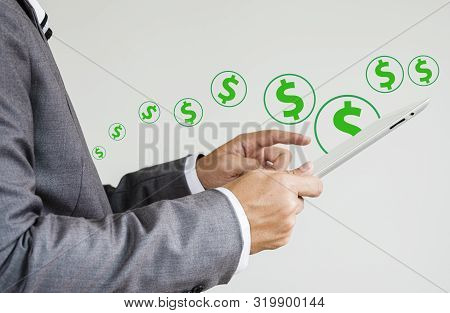 Businessman Touch On Tablet For Paying And Get Dollar Money From E-payment Business And Online Shopp