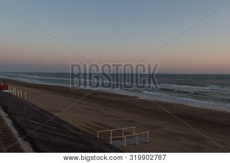 The View Of Twilight On Tyrrhenian Sea Beach.