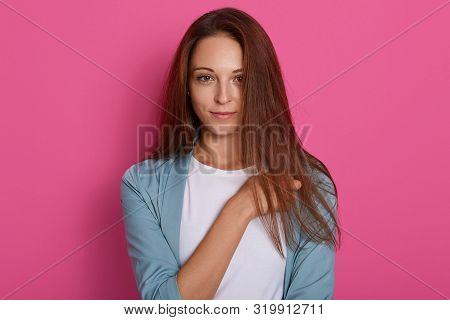 Gorgeous Brunette Young Woman With Long Glamorous Hair