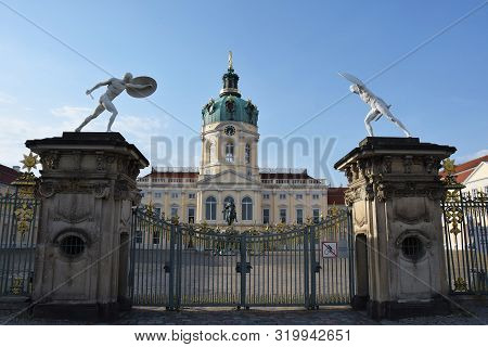 Gate With Soldiers With Guns At The Charlottenburg Palace. Berlin. May 2018