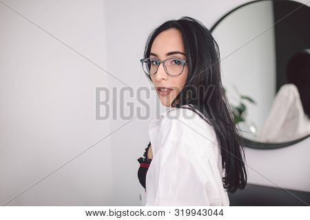 Fashion Luxury Lady In Man Shirt. Beauty Woman In Lingerie And Shirt Posing At Bedroom Near Mirror. 