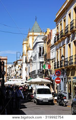 Ronda, Spain - October 24, 2009 - View Along A Busy Town Centre Shopping Street With The Socorro Chu