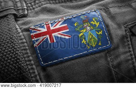 Tag On Dark Clothing In The Form Of The Flag Of The Pitcairn Islands