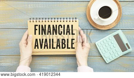 Text Financing Available On Notepad With Office Tools, Pen On Financial Report . Business And Financ