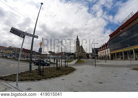 Limanowa, Poland - April 01, 2021: City Center Main Square With A Famous Church And Building Citysca