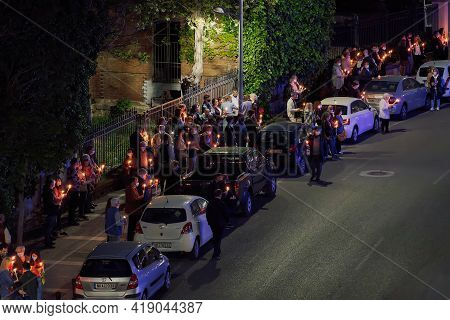 Thessaloniki, Greece - May 01 2021: Orthodox Easter 2021 Anastasi Resurrection. Faithful Wearing Fac
