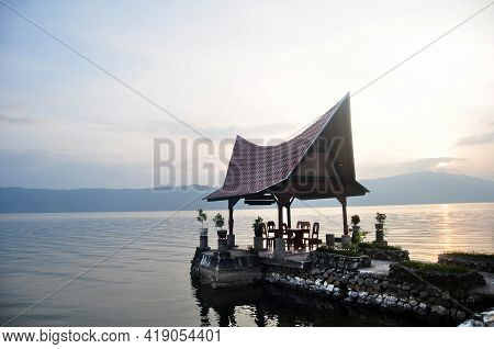 Pavilion Traditional Batak House Indonesia Style At Ambarita Of Resort Hotel Sunset Dusk Time At Dan