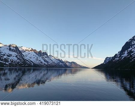 Northern Landscape With Mountains At The Foreground And Mountain Peak Troms County, Norway.