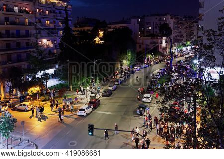 Thessaloniki, Greece - May 01 2021: Orthodox Easter 2021 Anastasi Resurrection. Faithful Wearing Fac