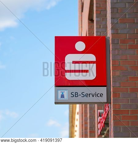 Magdeburg, Germany - April 25, 2021: Neon Sign Of The Branch Of A Sparkasse In The City Center Of Ma