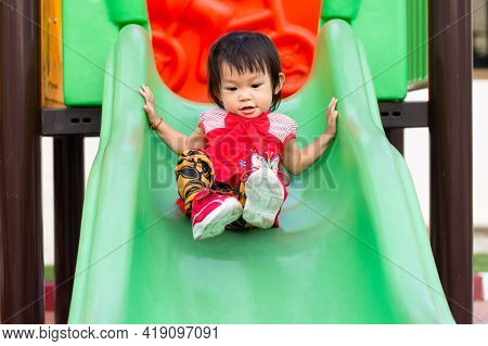 Portrait Image Of 1-2 Yeas Old Baby. Happy Asian Child Girl Smiling And Laughing. She Playing With S