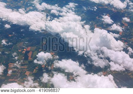 Above Earth And Clouds . Airplane Window View