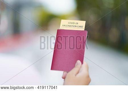 Passport With Vaccination Certificate For Covid-19 Person Record Card. Immune Passport Or Certificat