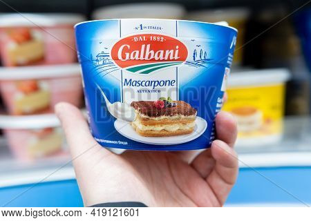 Tyumen, Russia-february 26, 2021: Pack Of Italian Galbani Mascarpone In The Buyer Hand