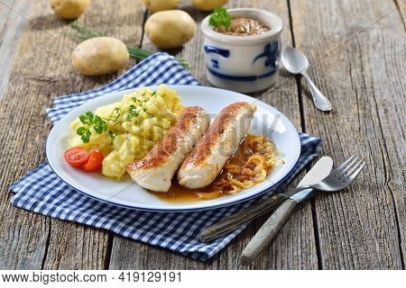 Fried Bavarian Sausages, So-called Wollwurst, A Specialty Similar To The German Veal Sausage But Wit