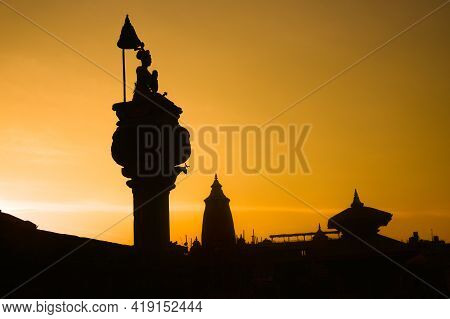 Silhouette Of Statue And Temple, Sunset View