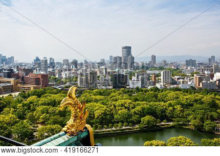 View From Above On Osaka City With Skyline With Skycrapers, Highways And Parks From Top Of Osaka Cas