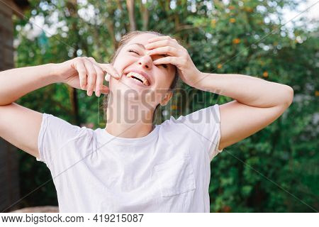 Young Woman Smiling Outdoor. Beautiful Brunete Girl Resting On Park Or Garden Green Background. Free