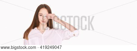 Pretty Girl Indoor Portrait. Light Background. Female Teenager Person. Long Brow Hair. Cleansing Dir