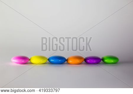 Close Up Of Gems Chocolate Candy With White Background