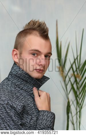 A Man With A Mohawk Wearing Shirt. Punk Hairstyle