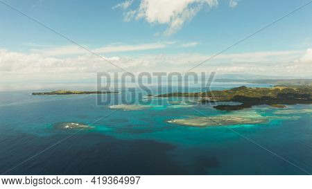 Seascape: Tropical Islands With Beaches And Azure Coral Reef Water From Above. Bucas Grande, Philipp