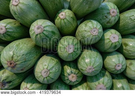 Green Background Of Zucchini Front View, Healthy Food Without Nitrates